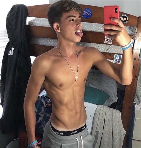 Filipino top fucks a white bottom twink ass raw .